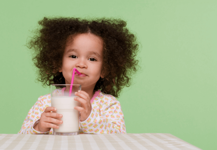 Young Girl Drinking Milk