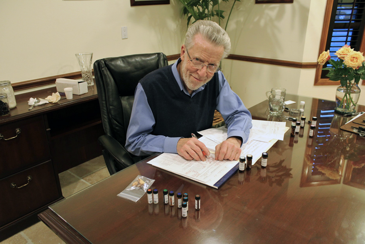 Dr. Marshall at his desk