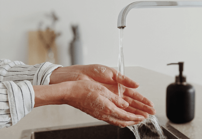 Person washing their hands